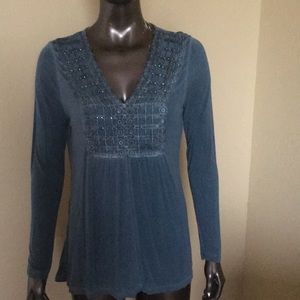 Top with smocking and sparkles